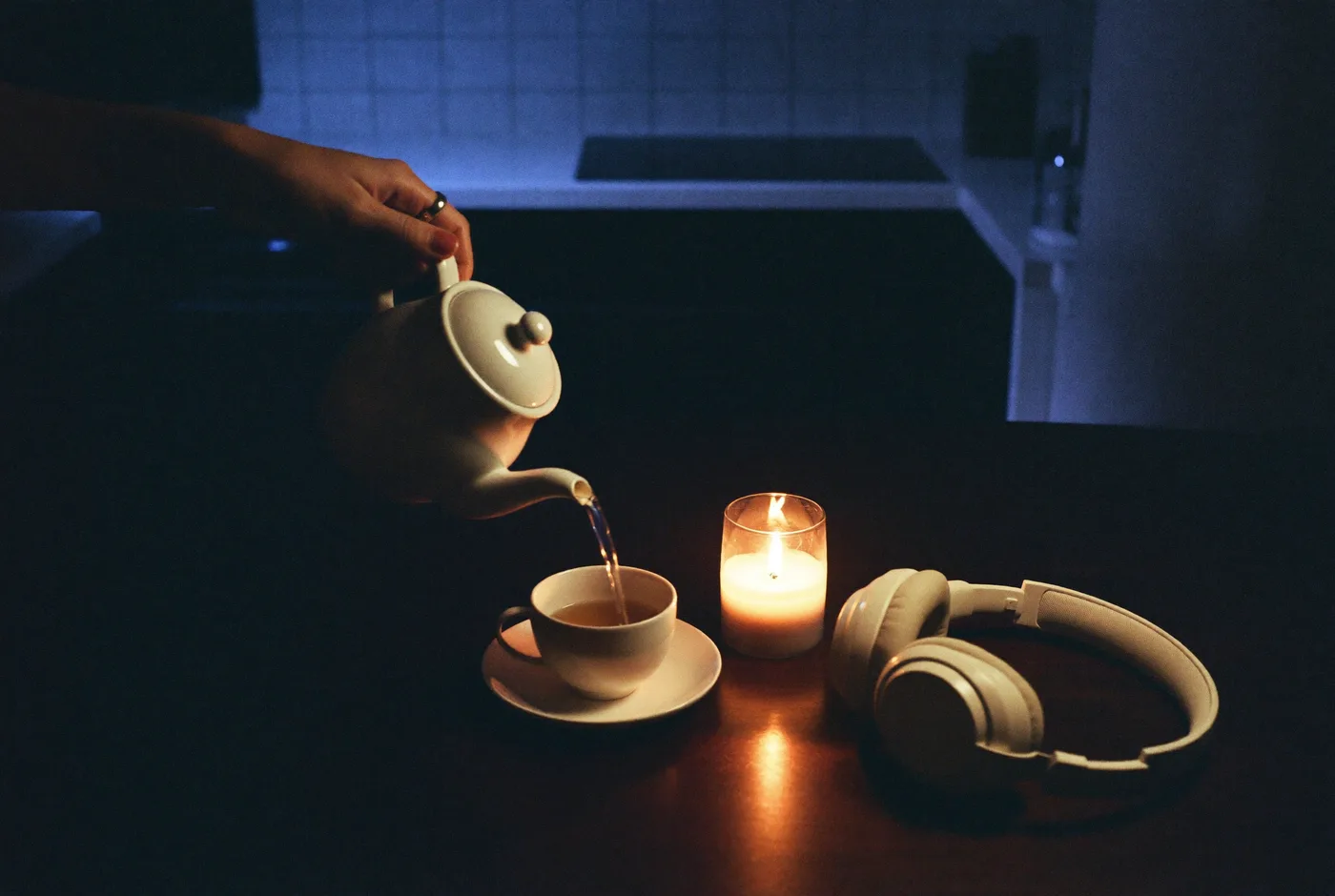 Pouring tea while listening